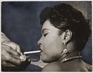 billie holiday wearing gloves.